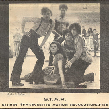 Black and white photo of the members of STAR. The text under the photo reads "S.T.A.R. Street Transvestite Action Revolutionaries."