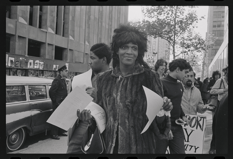 Download the full-sized image of A Photograph of Marsha P. Johnson Passing Out Flyers at a Demonstration