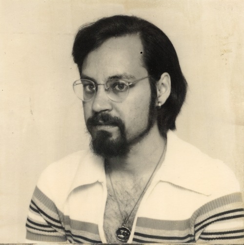 Download the full-sized image of Headshot of Rupert Raj in a Striped Shirt