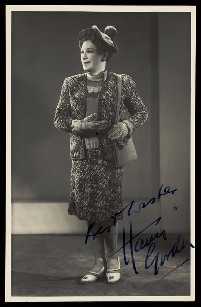 Download the full-sized image of Harry Gordon performing in drag. Photographic postcard, 194-.