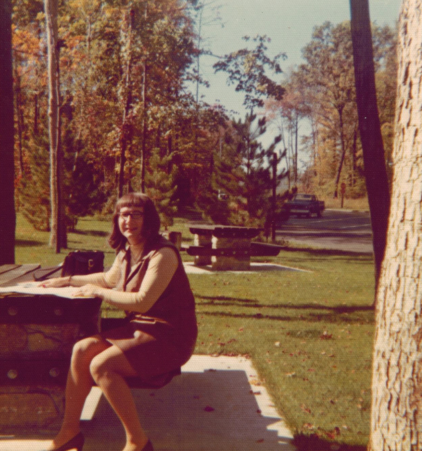 Download the full-sized image of Alison Laing at a Picnic Table