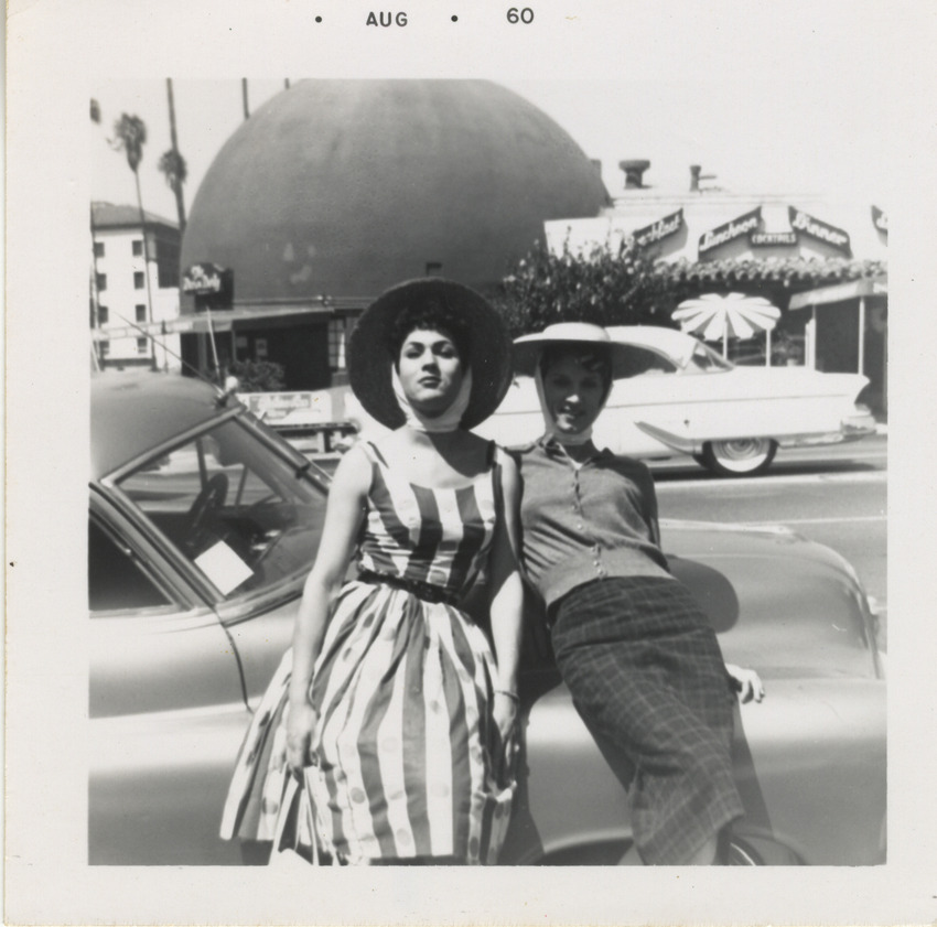 Download the full-sized image of Victoria Fernandez and companion with car