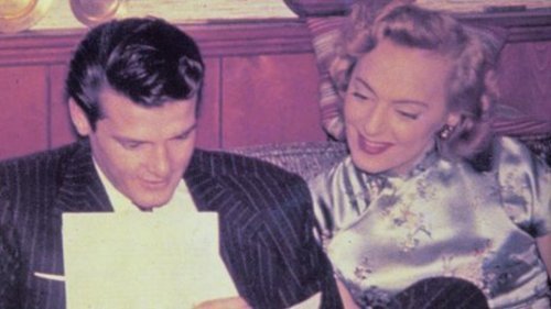 Download the full-sized image of Christine Jorgensen and Roger Moore